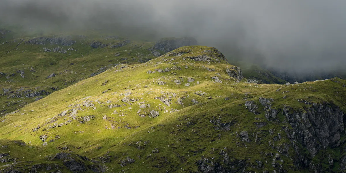 The boggy path up towards An Caisteal in the mizzle