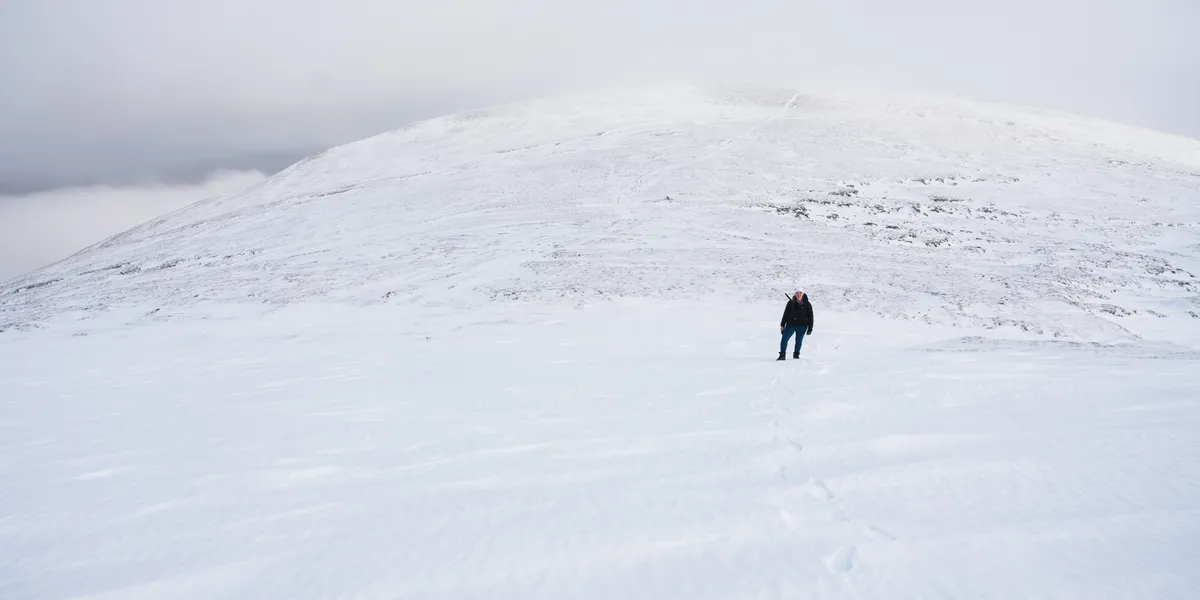 Donna on the bealach between Creagan Mor and Geal Charn