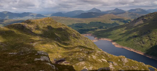 Ben Vane Munro hiking guide: Challenging 13.8km route with 959m ascent in the Arrochar Alps. Route map, parking at Inveruglas Pier, and spectacular Loch Sloy views. Perfect for experienced hikers.