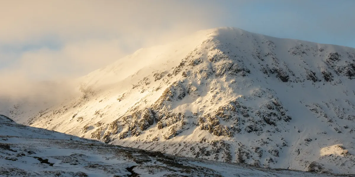 Looking up at Creise through the snow
