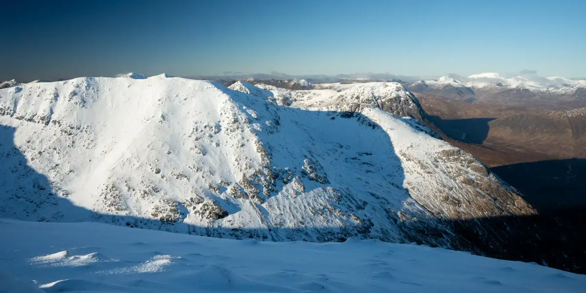 Donna on the upper slopes with stunning winter views
