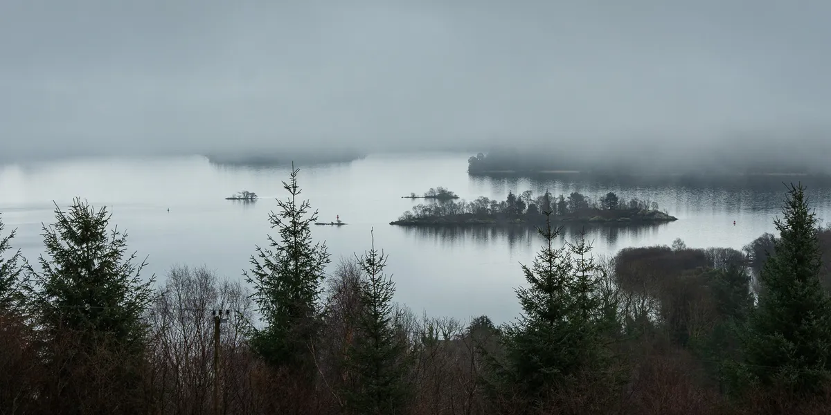 A break in the clouds looking back at Loch Lomond